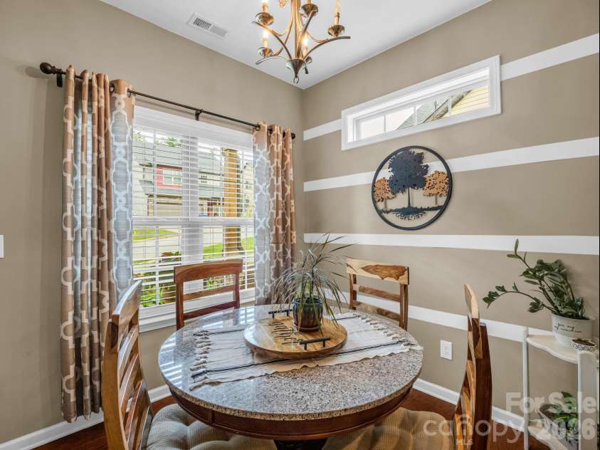 8 Mallard Run Drive, Arden, NC 28704.  MLS# CAR4395939, YatesRealty ID 34277. Bright and inviting dining area.