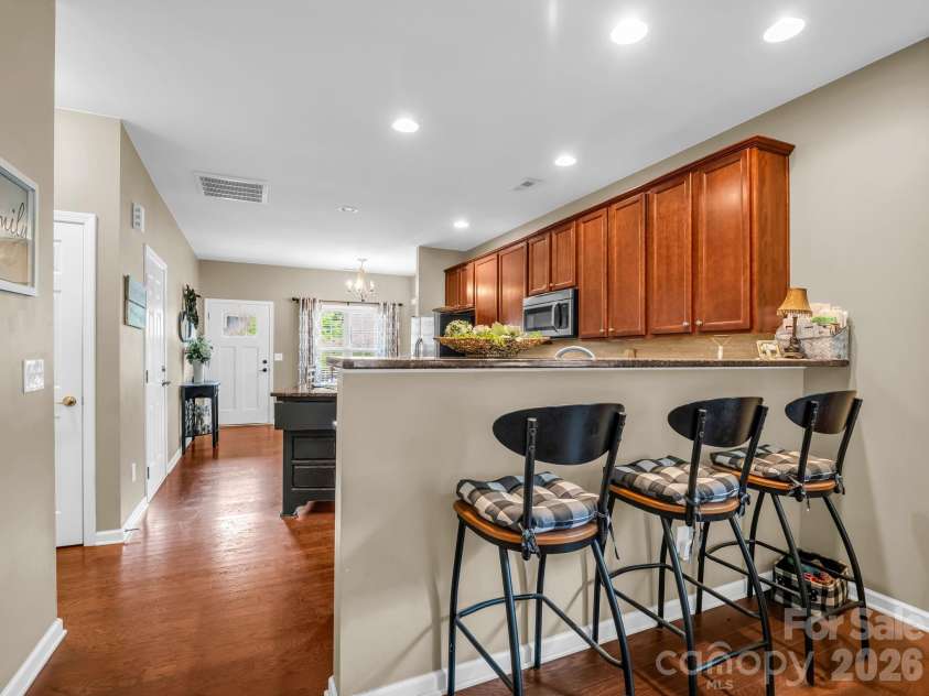 8 Mallard Run Drive, Arden, NC 28704.  MLS# CAR4395939, YatesRealty ID 34277. Mornings are easy with breakfast bar seating.