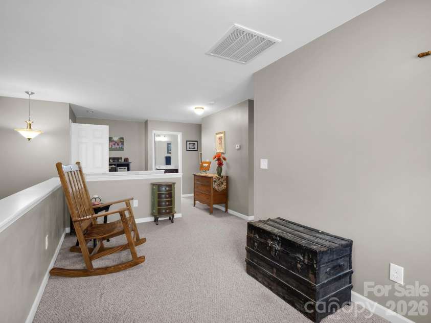 8 Mallard Run Drive, Arden, NC 28704.  MLS# CAR4395939, YatesRealty ID 34277. Upper level loft area.