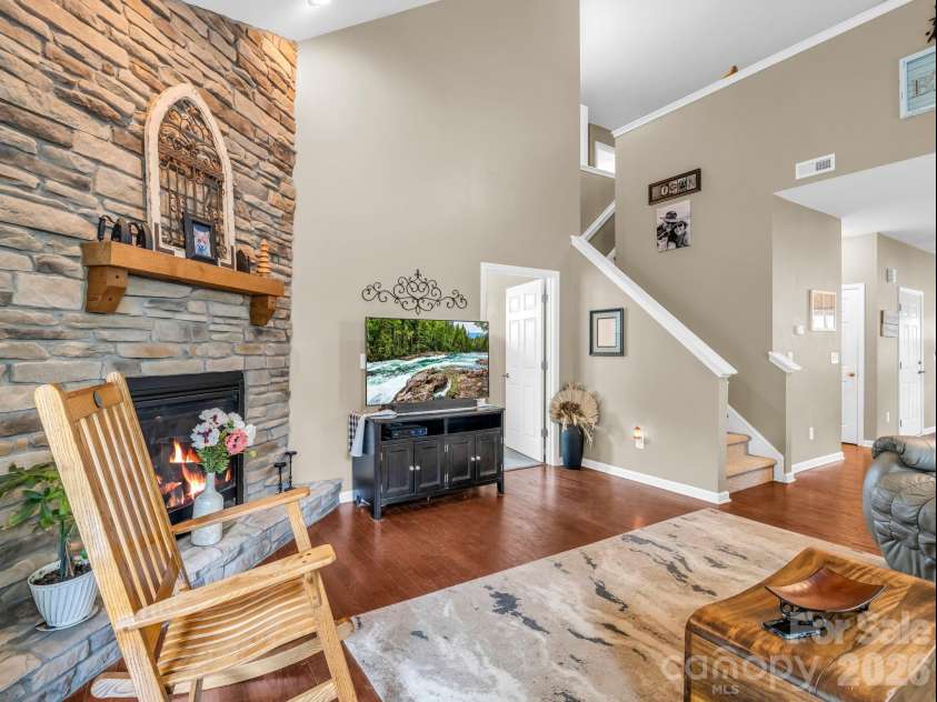 8 Mallard Run Drive, Arden, NC 28704.  MLS# CAR4395939, YatesRealty ID 34277. View from living room to upper level.