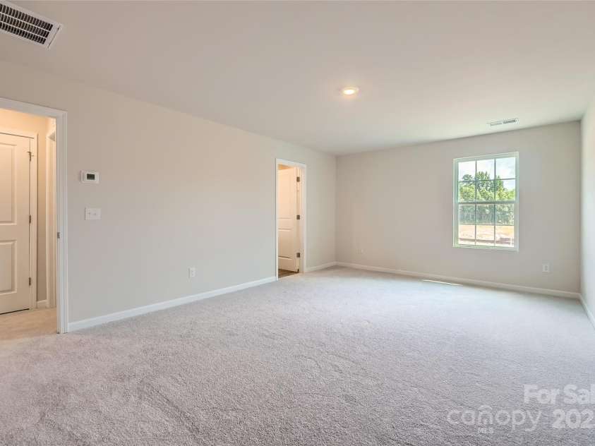 3290 Crawford Avenue, Gastonia, NC 28052.  MLS# CAR4295691, YatesRealty ID 34279. Owner's Suite(example)