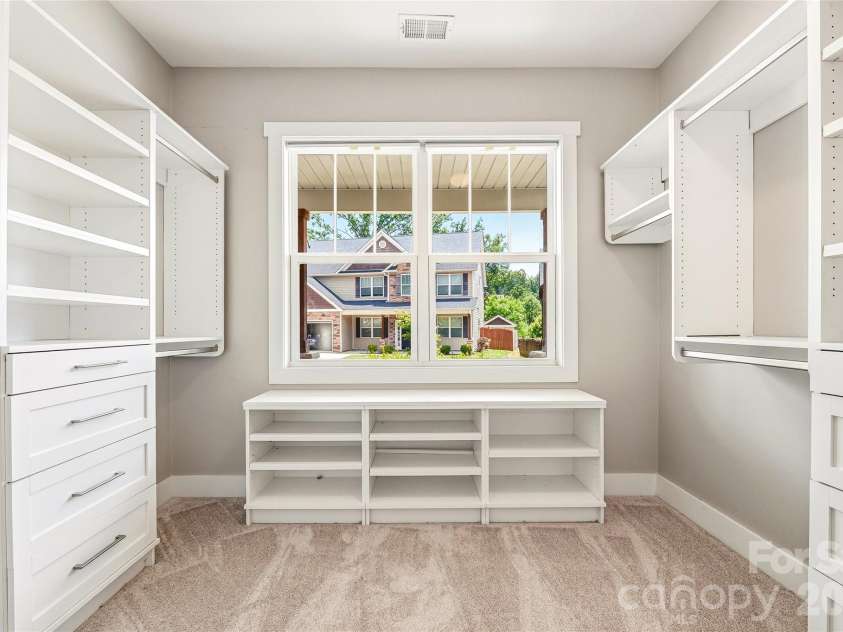 16 Henbit Way, Arden, NC 28704.  MLS# CAR4394506, YatesRealty ID 34286. Custom Primary with Built-in closet system 