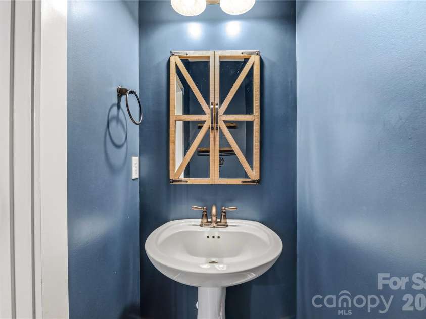 16 Henbit Way, Arden, NC 28704.  MLS# CAR4394506, YatesRealty ID 34286. Half Bath off Kitchen 