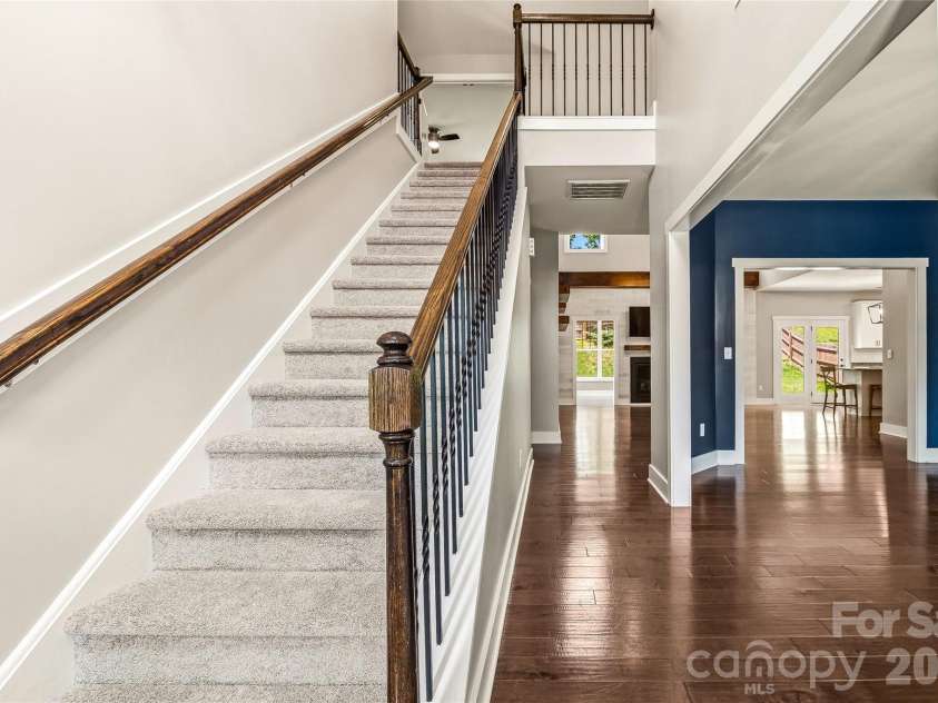 16 Henbit Way, Arden, NC 28704.  MLS# CAR4394506, YatesRealty ID 34286. Light-filled entrance. New carpet.