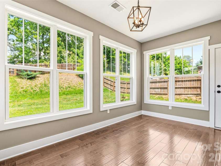 16 Henbit Way, Arden, NC 28704.  MLS# CAR4394506, YatesRealty ID 34286. Light Filled Sun Room/Bonus/Office- see floor plan 