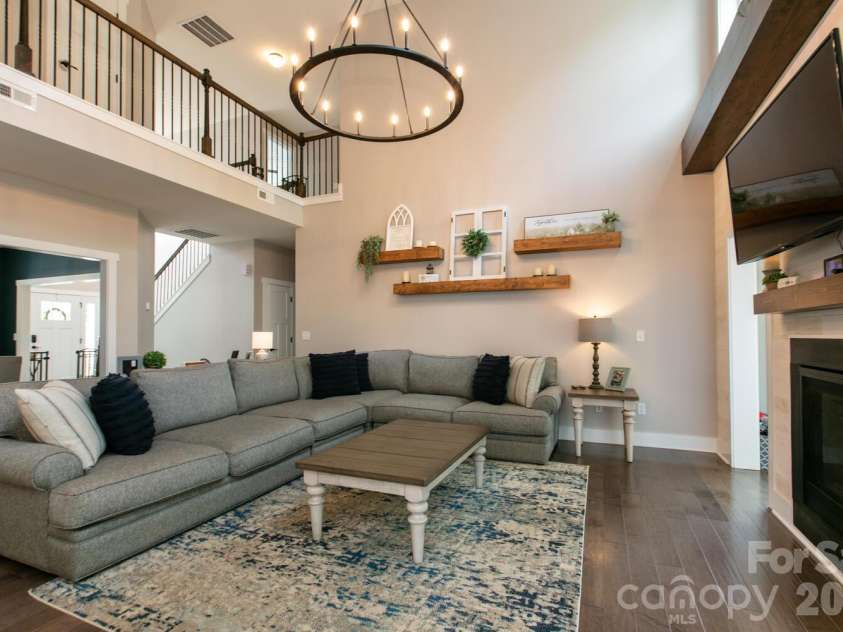 16 Henbit Way, Arden, NC 28704.  MLS# CAR4394506, YatesRealty ID 34286. Open Living Room 