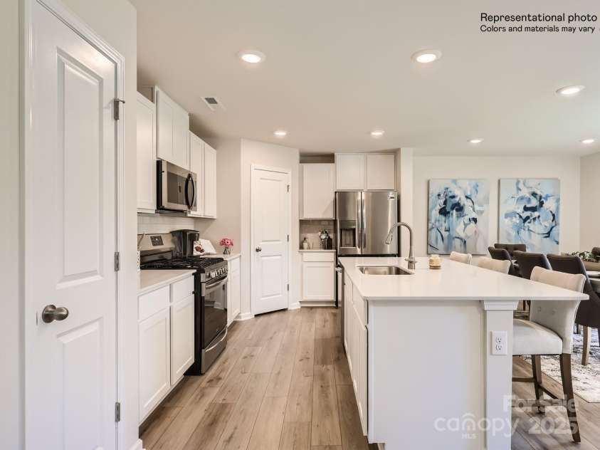 143 Arden Court, Troutman, NC 28166.  MLS# CAR4295976, YatesRealty ID 34289. Kitchen