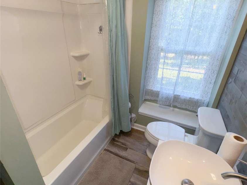 368 Gaddy Farm Road, Mount Gilead, NC 27306.  MLS# CAR4296067, YatesRealty ID 34295. Upstairs Bathroom