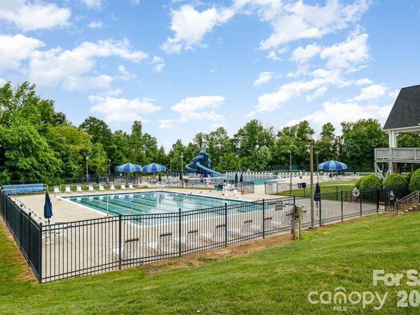 9776 Ravenscroft Lane, Concord, NC 28027.  MLS# CAR4335767, YatesRealty ID 3430. Community pool 