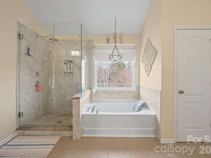 9776 Ravenscroft Lane, Concord, NC 28027.  MLS# CAR4335767, YatesRealty ID 3430. Updated shower 