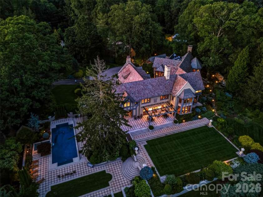 7 Stuyvesant Road, Biltmore Forest, NC 28803.  MLS# CAR4399197, YatesRealty ID 34302. Discreet landscape lighting illuminates your peaceful evenings