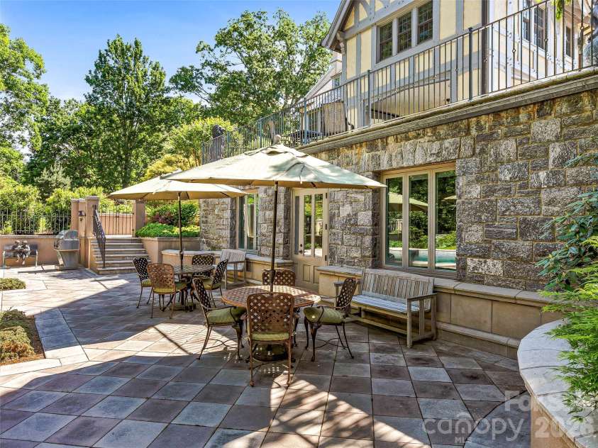 7 Stuyvesant Road, Biltmore Forest, NC 28803.  MLS# CAR4399197, YatesRealty ID 34302. Pool terrace