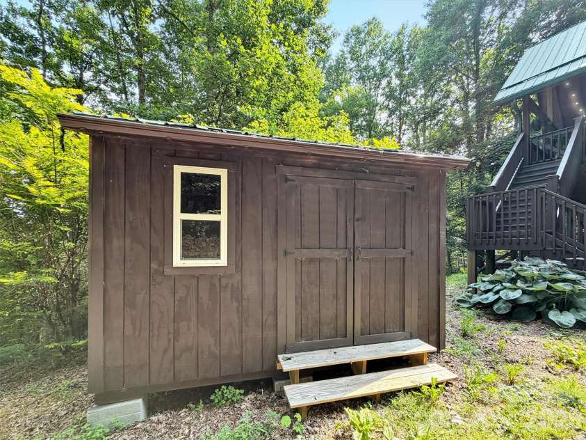 49 Brandywine Road, Waynesville, NC 28786.  MLS# CAR4395907, YatesRealty ID 34304. Handy storage shed