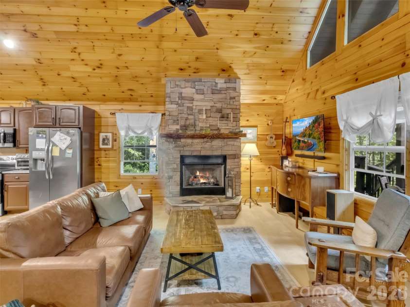 49 Brandywine Road, Waynesville, NC 28786.  MLS# CAR4395907, YatesRealty ID 34304. Impressive fireplace