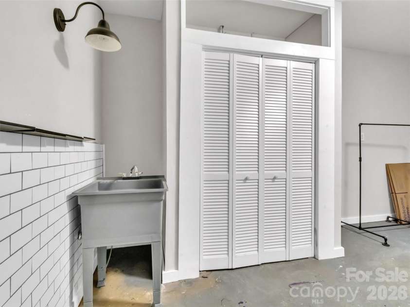 49 Brandywine Road, Waynesville, NC 28786.  MLS# CAR4395907, YatesRealty ID 34304. Utility room
