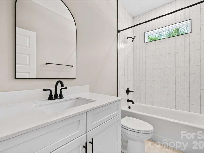 5702 Love Mill Road, Monroe, NC 28110.  MLS# CAR4398637, YatesRealty ID 34306. Downstairs full bath