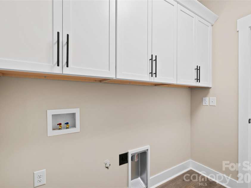 5702 Love Mill Road, Monroe, NC 28110.  MLS# CAR4398637, YatesRealty ID 34306. Laundry room