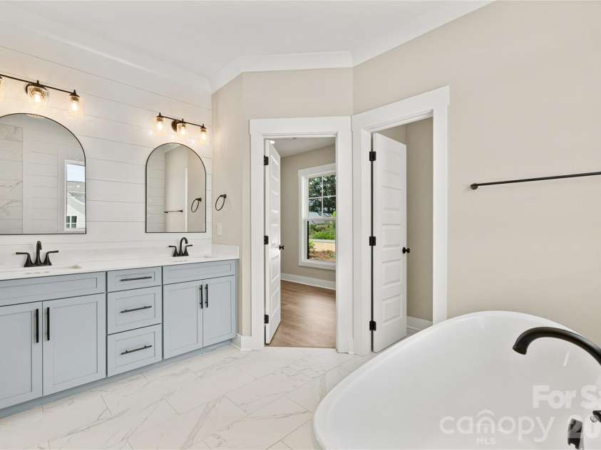 5702 Love Mill Road, Monroe, NC 28110.  MLS# CAR4398637, YatesRealty ID 34306. Primary Bathroom