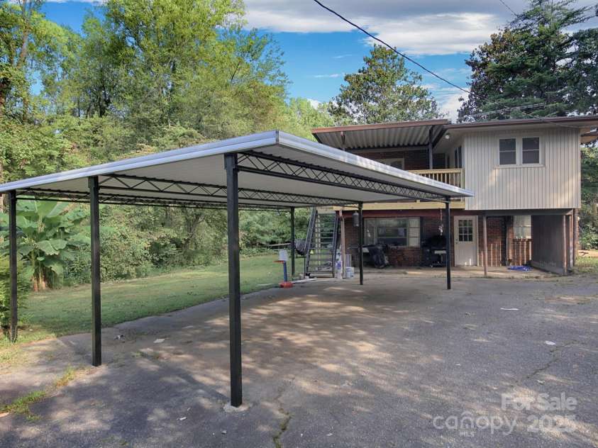 3119 Hickory Highway, Statesville, NC 28677.  MLS# CAR4161223, YatesRealty ID 3431. Carport at the rear