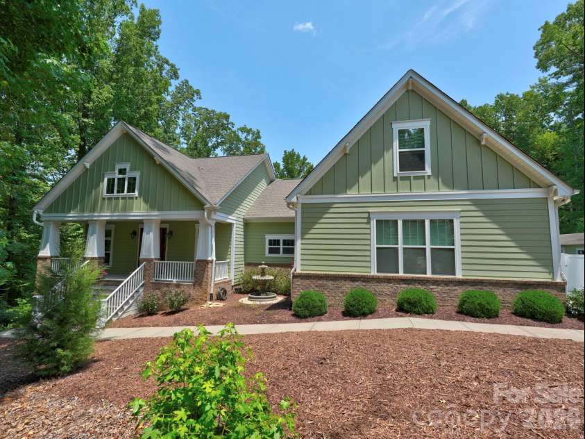 9560 Regent Drive, Davidson, NC 28036.  MLS# CAR4397866, YatesRealty ID 34310. Front Exterior