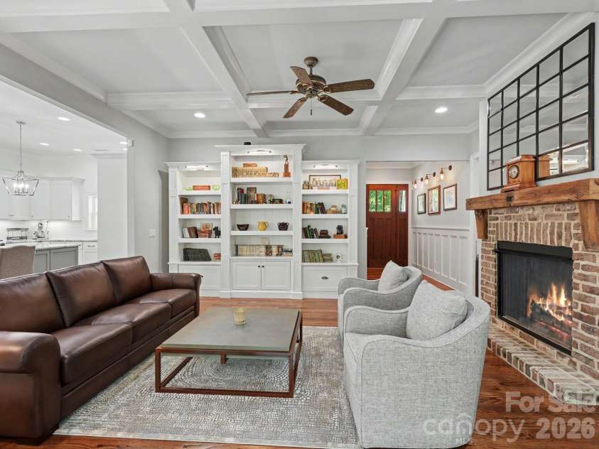 9560 Regent Drive, Davidson, NC 28036.  MLS# CAR4397866, YatesRealty ID 34310. Great room with built-ins and fireplace /gas logs
