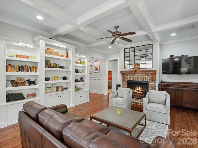 9560 Regent Drive, Davidson, NC 28036.  MLS# CAR4397866, YatesRealty ID 34310. Great room with built-ins and fireplace /gas logs