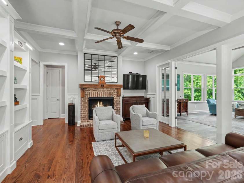 9560 Regent Drive, Davidson, NC 28036.  MLS# CAR4397866, YatesRealty ID 34310. Great room with fireplace and built-ins