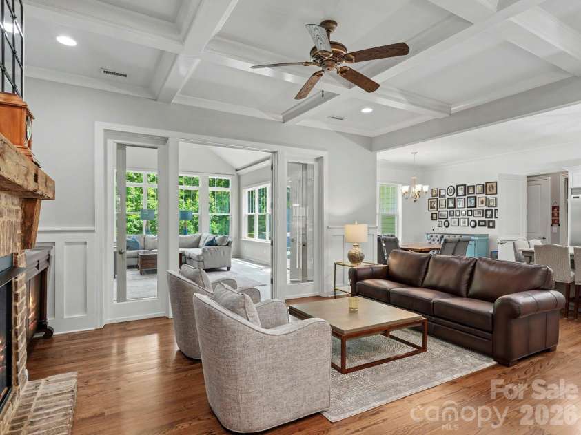 9560 Regent Drive, Davidson, NC 28036.  MLS# CAR4397866, YatesRealty ID 34310. Great room with french doors leading to huge sunroom