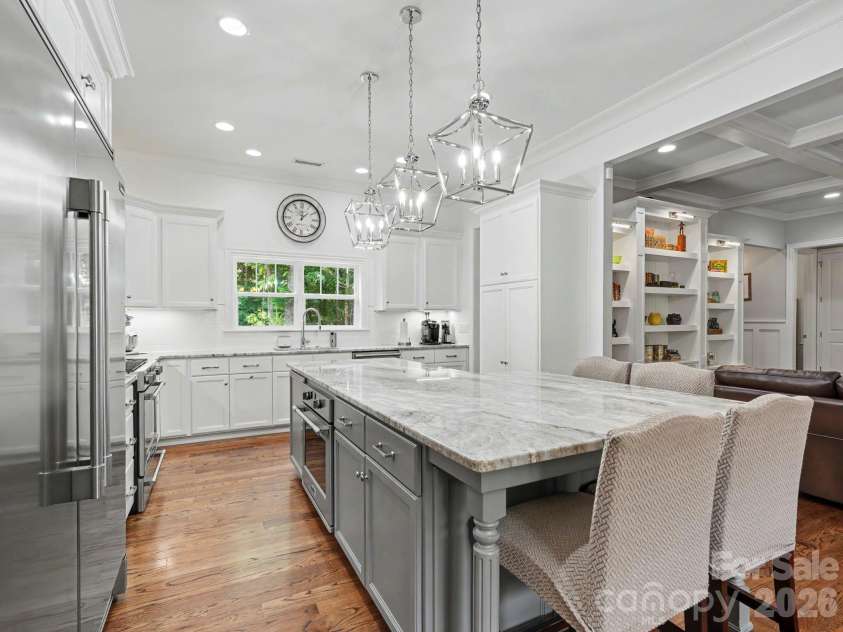 9560 Regent Drive, Davidson, NC 28036.  MLS# CAR4397866, YatesRealty ID 34310. Kitchen with island/ breakfast bar