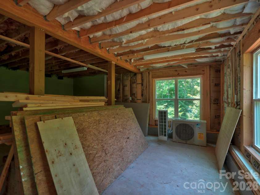 9560 Regent Drive, Davidson, NC 28036.  MLS# CAR4397866, YatesRealty ID 34310. Partially finished basement room for workshop or private office