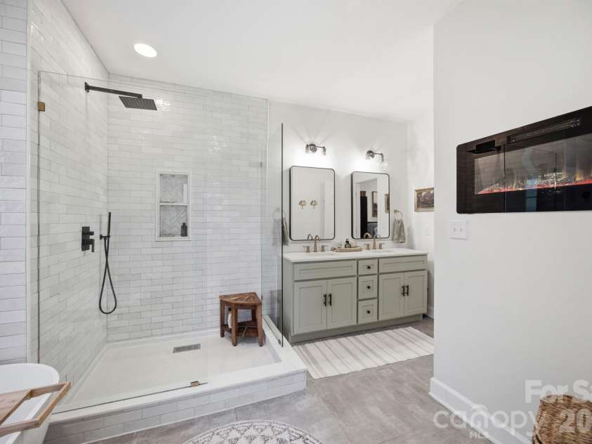 755 Lake Wright Road, China Grove, NC 28023.  MLS# CAR4395859, YatesRealty ID 34311. Cozy fireplace in your primary bath