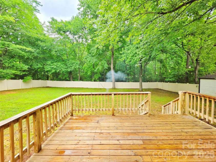 133 Winged Elm Lane, Mooresville, NC 28115.  MLS# CAR4398819, YatesRealty ID 34314. Back Deck overlooks expansive back yard.