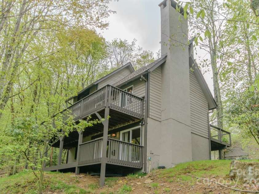 114 Locust Ridge Road, Beech Mountain, NC 28604.  MLS# CAR4295820, YatesRealty ID 34315. Back of home