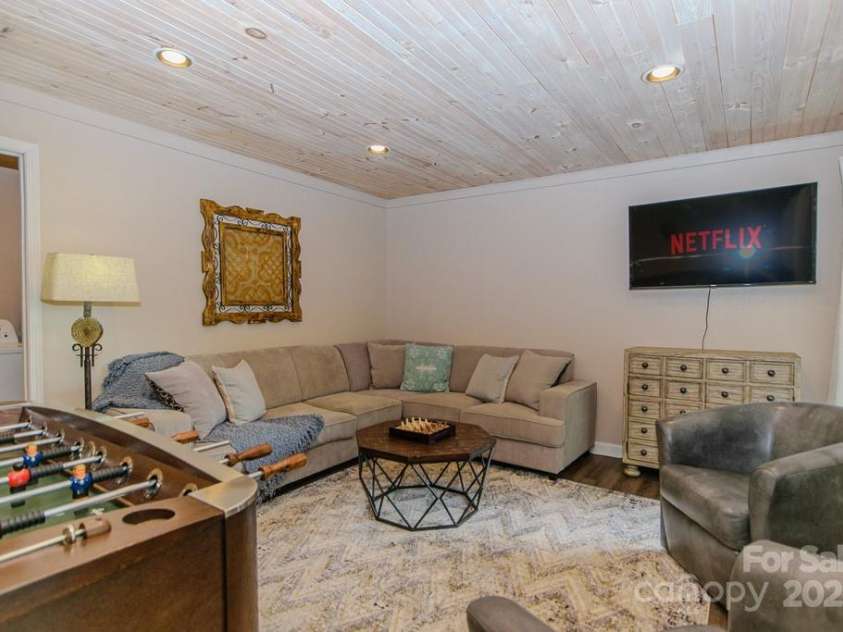 114 Locust Ridge Road, Beech Mountain, NC 28604.  MLS# CAR4295820, YatesRealty ID 34315. Lower level den/ game room