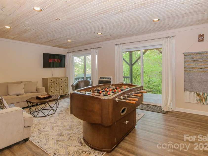 114 Locust Ridge Road, Beech Mountain, NC 28604.  MLS# CAR4295820, YatesRealty ID 34315. Lower level den/ game room