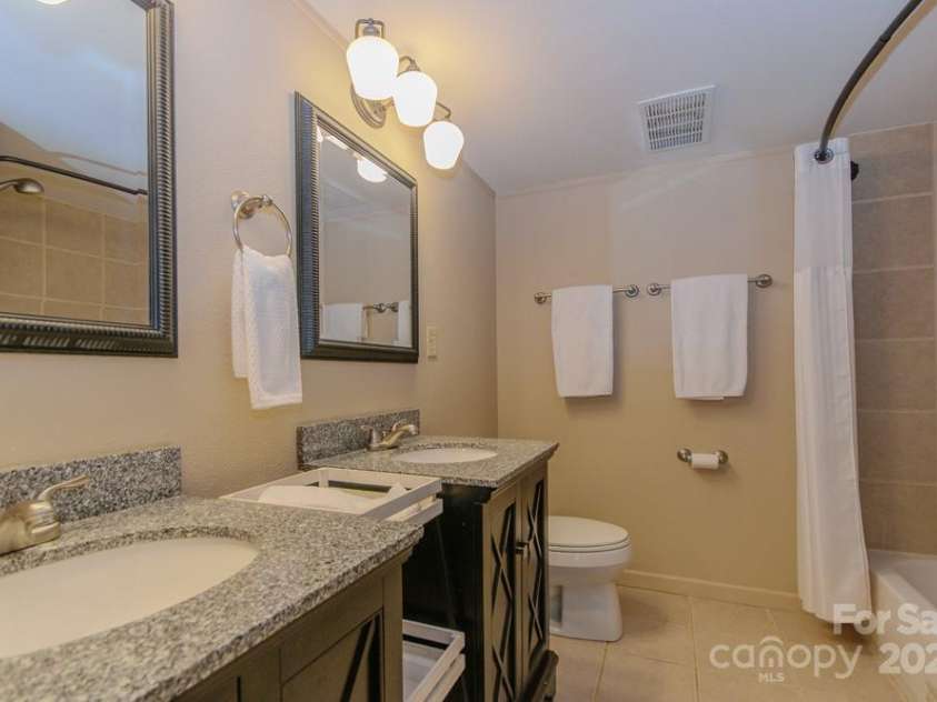114 Locust Ridge Road, Beech Mountain, NC 28604.  MLS# CAR4295820, YatesRealty ID 34315. Primary ensuite bathroom