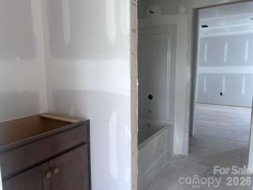 1206 Chasity Trails Court, Matthews, NC 28104.  MLS# CAR4398465, YatesRealty ID 34315. Jack and Jill Bathroom