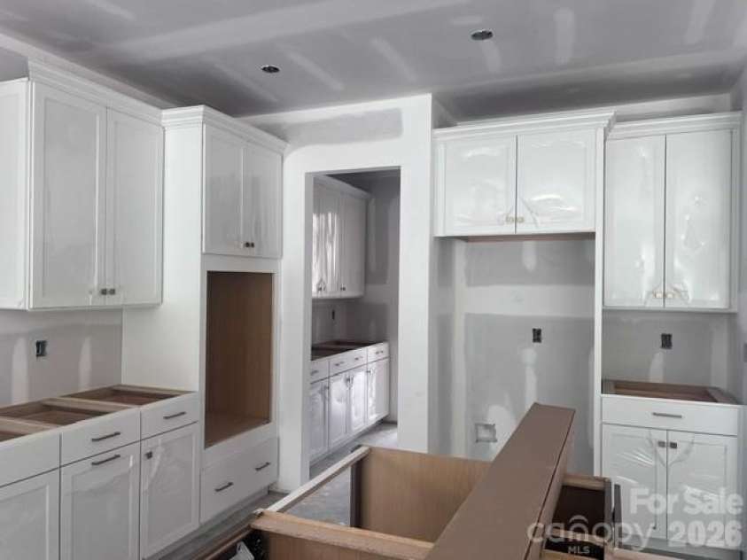 1206 Chasity Trails Court, Matthews, NC 28104.  MLS# CAR4398465, YatesRealty ID 34315. Kitchen Cabinets