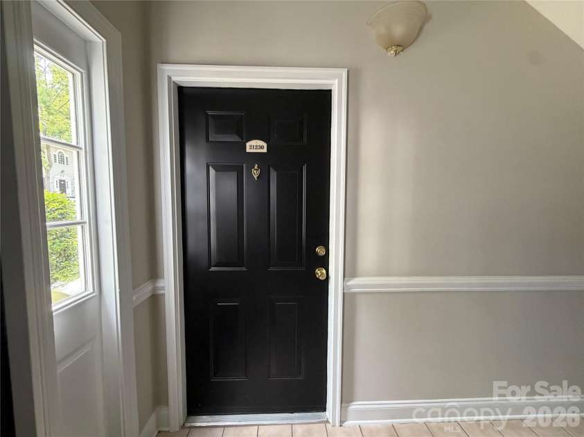 21230 Hickory Street, Cornelius, NC 28031.  MLS# CAR4374106, YatesRealty ID 34318. Front Entry