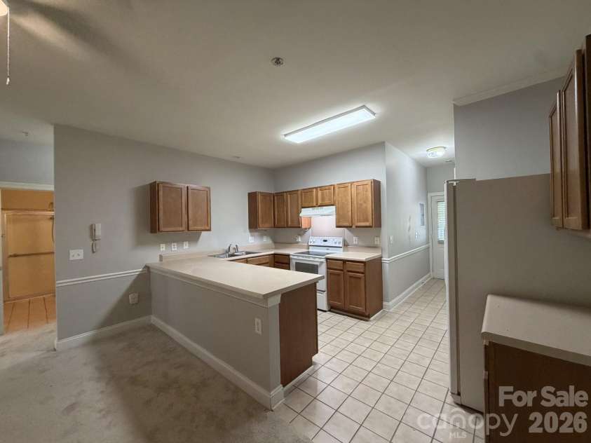 21230 Hickory Street, Cornelius, NC 28031.  MLS# CAR4374106, YatesRealty ID 34318. Kitchen