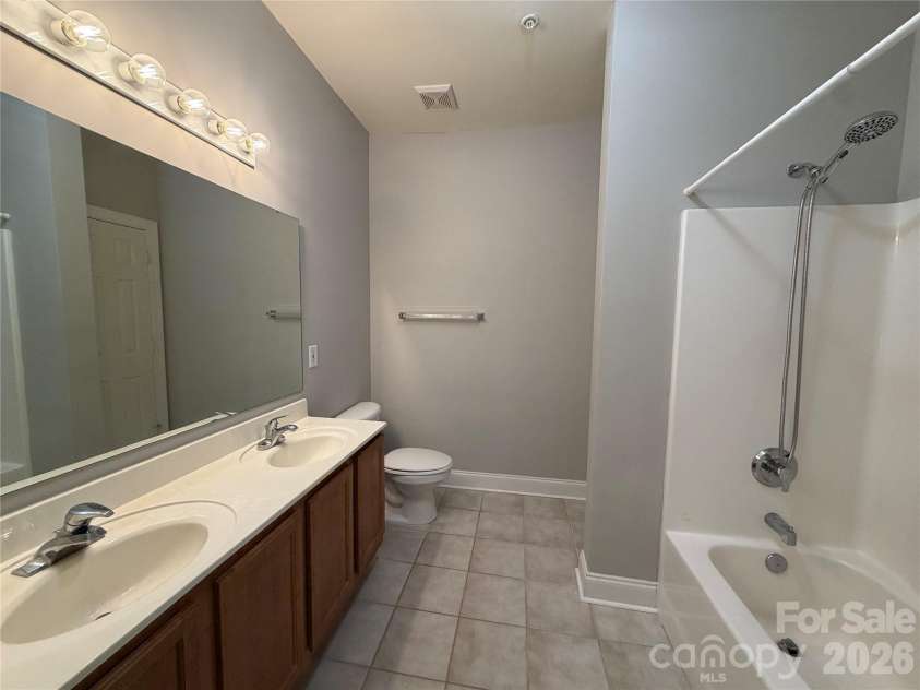 21230 Hickory Street, Cornelius, NC 28031.  MLS# CAR4374106, YatesRealty ID 34318. Primary Bathroom