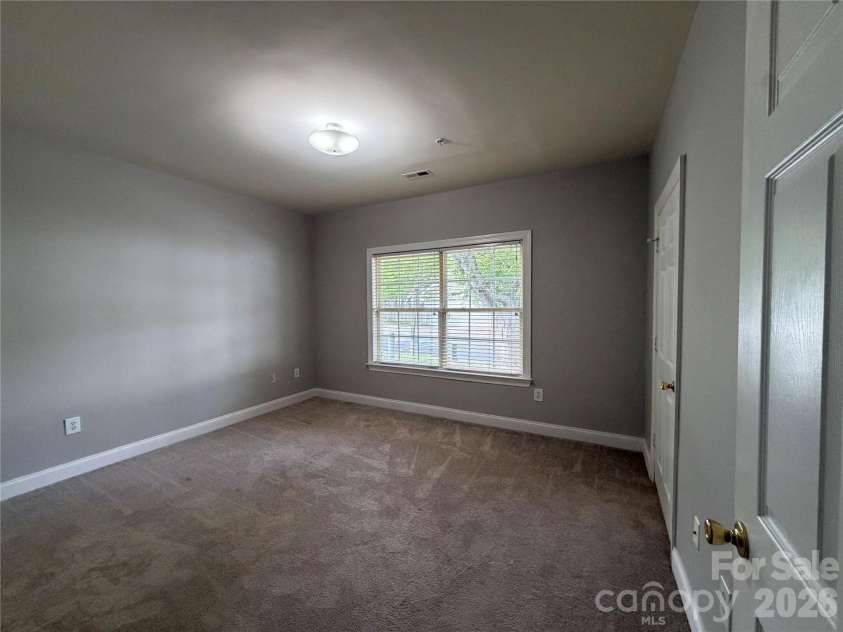 21230 Hickory Street, Cornelius, NC 28031.  MLS# CAR4374106, YatesRealty ID 34318. Primary Bedroom