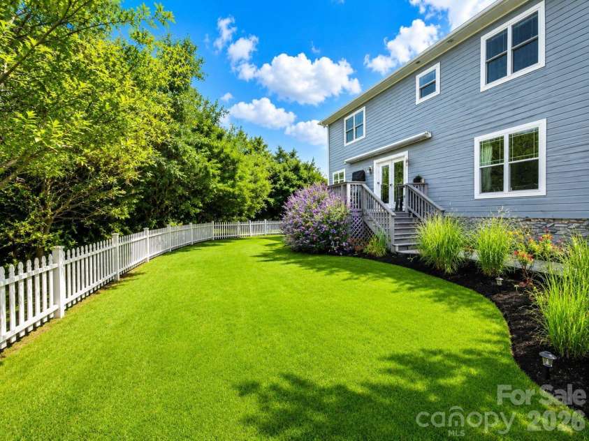 18027 Northport Drive, Cornelius, NC 28031.  MLS# CAR4395326, YatesRealty ID 34320. Large Yard