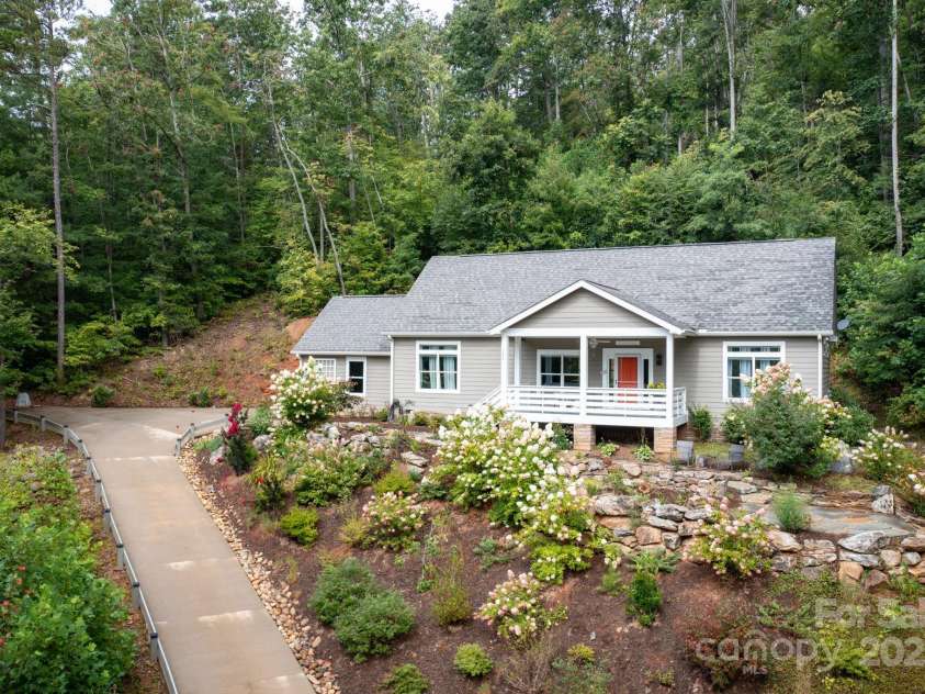 209 Patriots Drive, Asheville, NC 28805.  MLS# CAR4291919, YatesRealty ID 34321. 3 beds 2 baths 1 car garage on 1.3 acres super convenient.