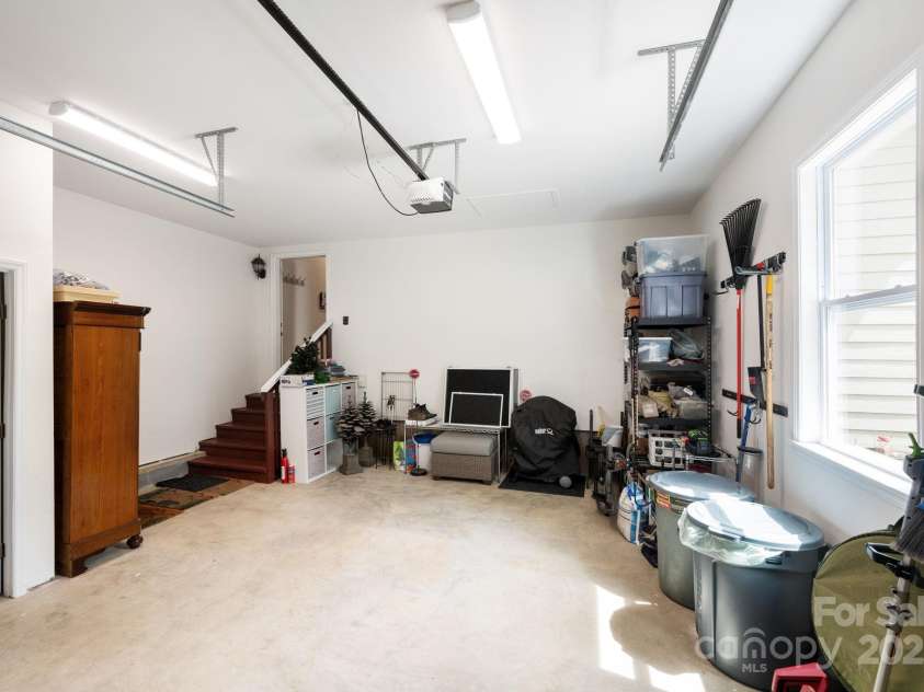209 Patriots Drive, Asheville, NC 28805.  MLS# CAR4291919, YatesRealty ID 34321. Large 1 car garage and storage, separate closet/room to the left.