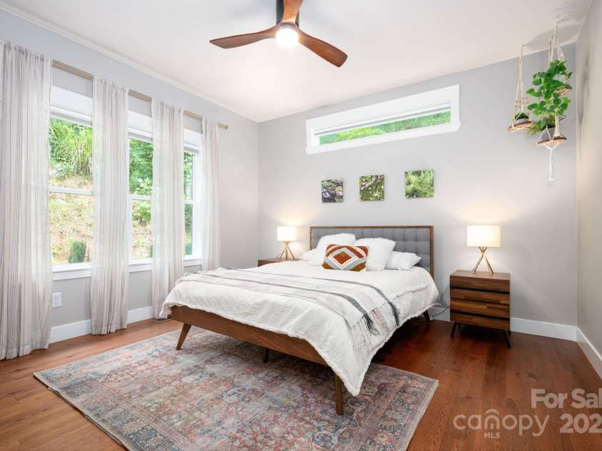 209 Patriots Drive, Asheville, NC 28805.  MLS# CAR4291919, YatesRealty ID 34321. One of two guest rooms, love the transom window.