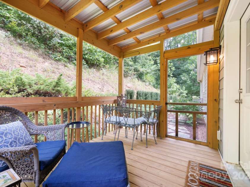 209 Patriots Drive, Asheville, NC 28805.  MLS# CAR4291919, YatesRealty ID 34321. Screened porch off the back.