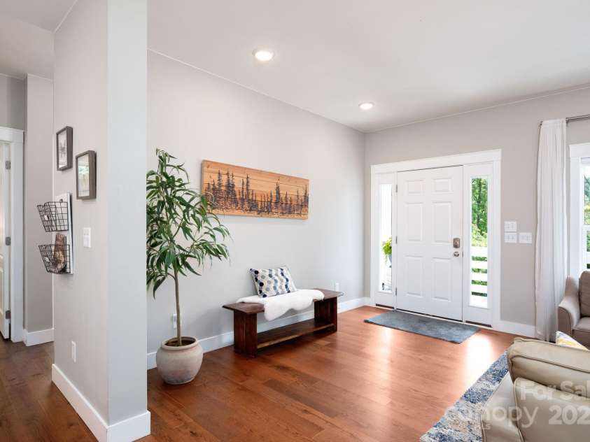 209 Patriots Drive, Asheville, NC 28805.  MLS# CAR4291919, YatesRealty ID 34321. Step inside to tranquility.