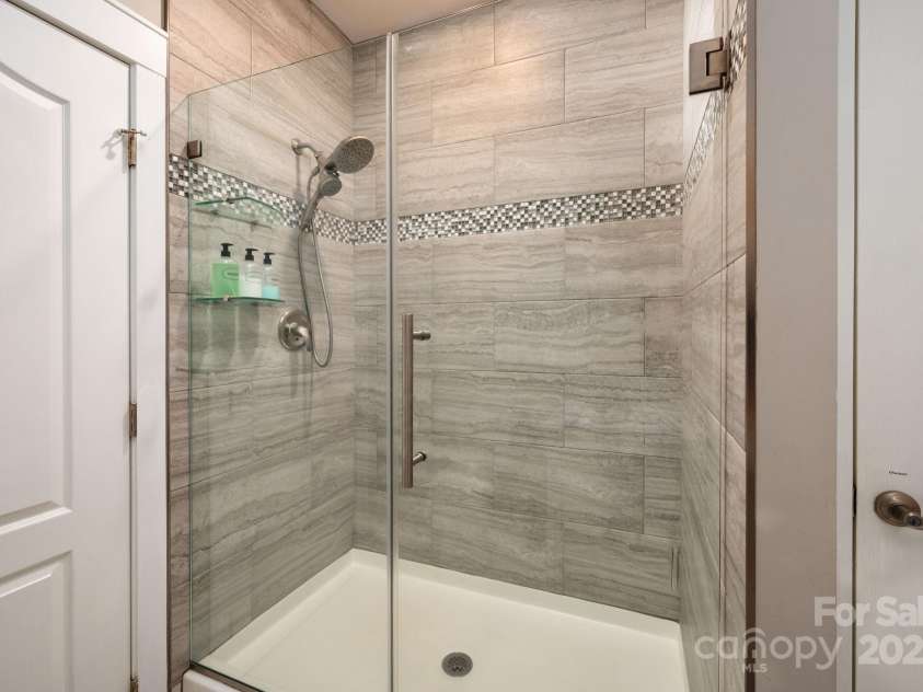 209 Patriots Drive, Asheville, NC 28805.  MLS# CAR4291919, YatesRealty ID 34321. Tile and glass.