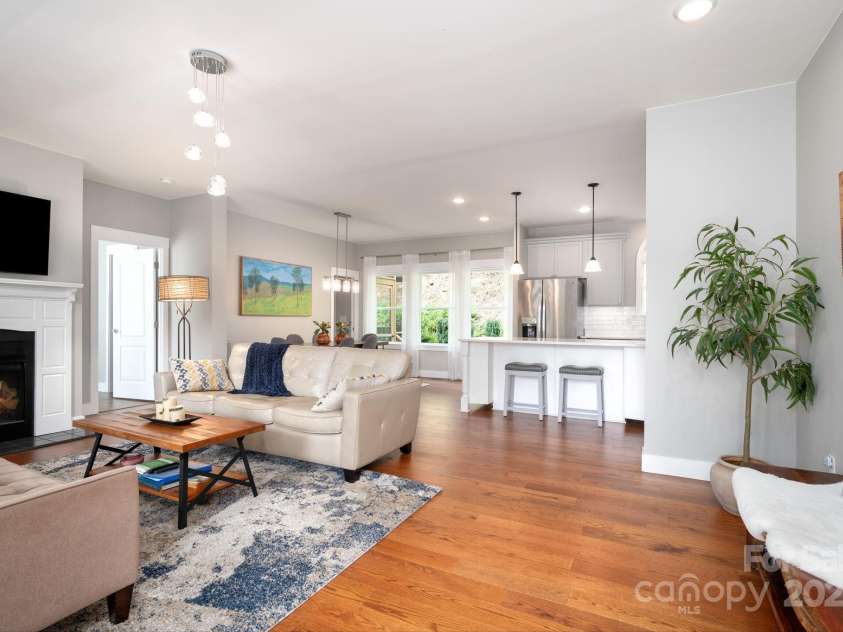 209 Patriots Drive, Asheville, NC 28805.  MLS# CAR4291919, YatesRealty ID 34321. Wood floors and open concept.
